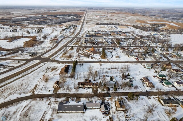 289 2nd St SW, Forman, ND 58032 - snowy aerial view featuring a residential view