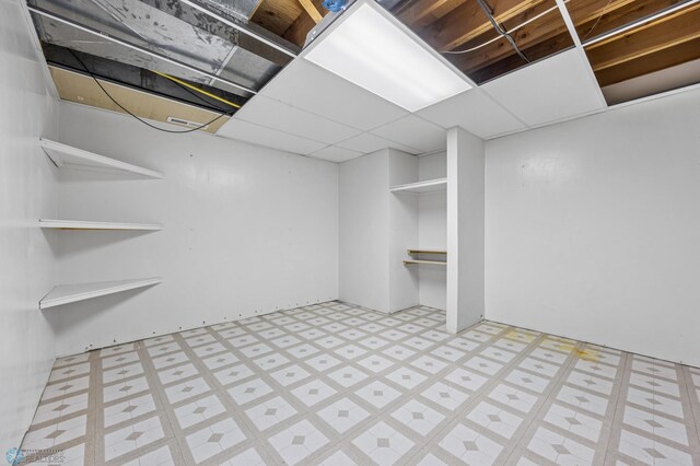 289 2nd St SW, Forman, ND 58032 - finished basement featuring tile patterned floors