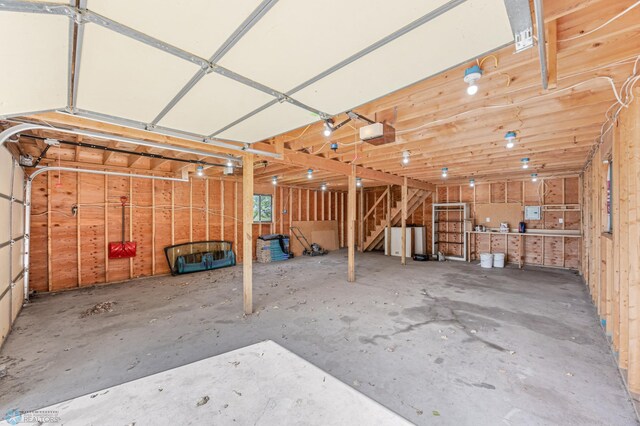 289 2nd St SW, Forman, ND 58032 - garage featuring a garage door opener