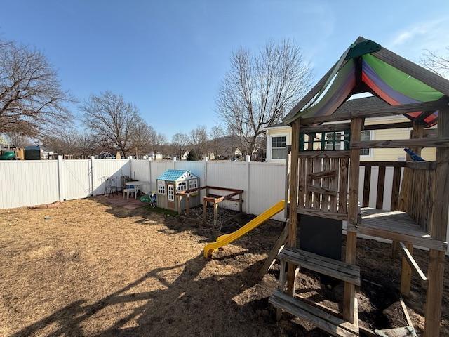 view of play area featuring a fenced backyard