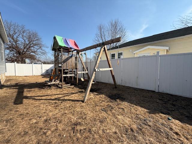 view of play area featuring a fenced backyard