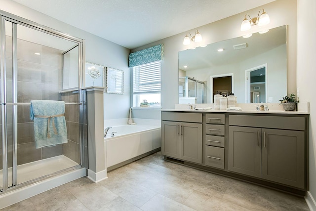 full bathroom featuring a sink, visible vents, a bath, double vanity, and a stall shower