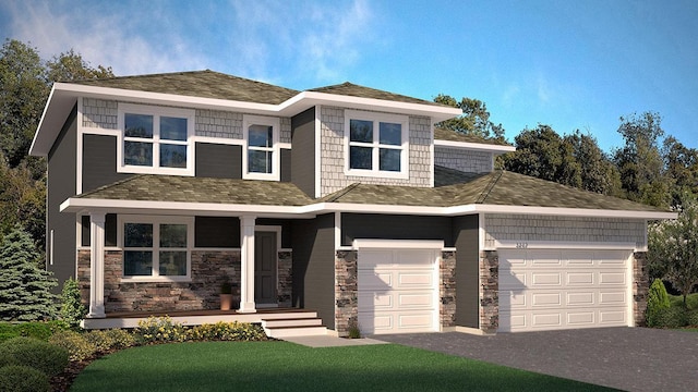 prairie-style house with driveway, stone siding, a porch, an attached garage, and a front lawn