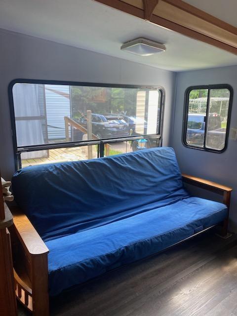 bedroom with wood finished floors