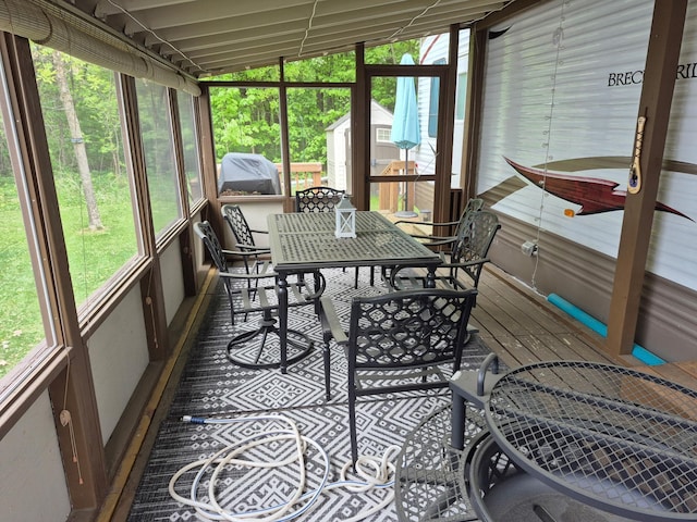13087 Twilight Rd # 15, Onamia, MN 56359 - sunroom with plenty of natural light and outdoor dining space