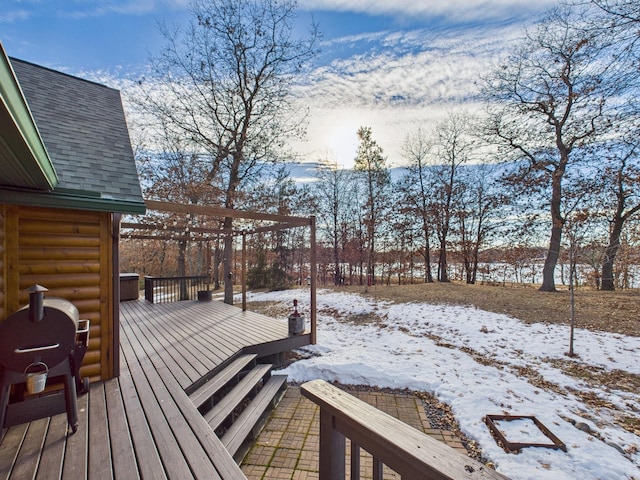 view of snow covered deck