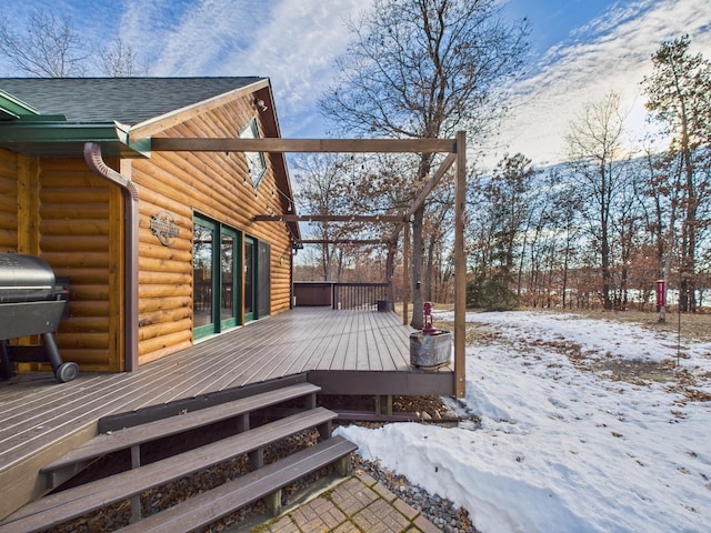 snow covered deck featuring grilling area