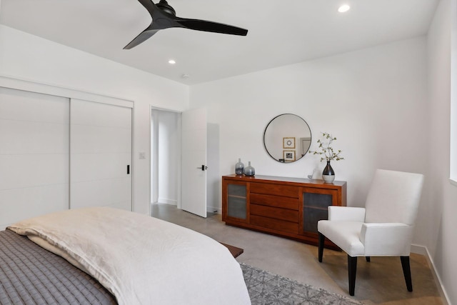 bedroom with a closet, baseboards, a ceiling fan, and recessed lighting