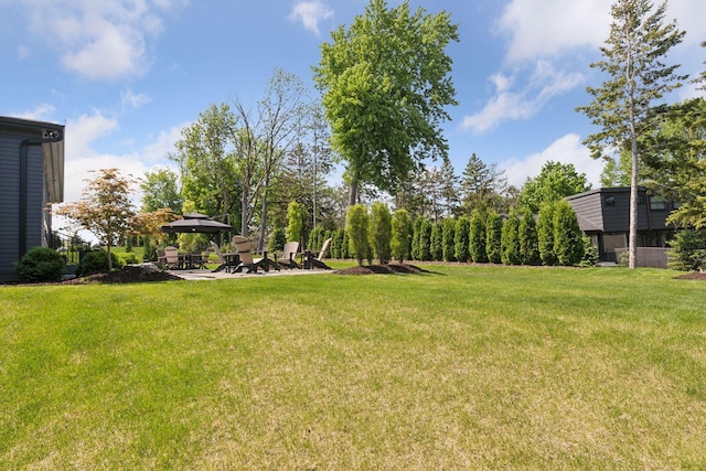 view of yard featuring a patio and a gazebo