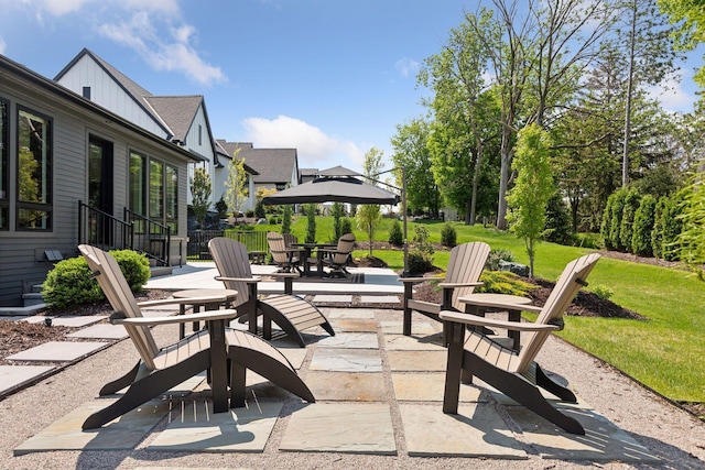 view of patio featuring fence