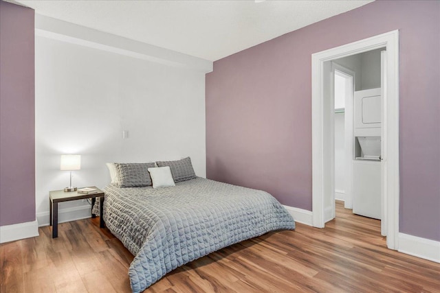 79 Western Ave N Unit 305, Saint Paul, MN 55102 - bedroom with baseboards and wood finished floors