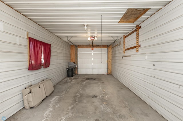 garage featuring metal wall