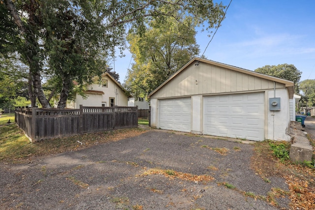 detached garage with fence