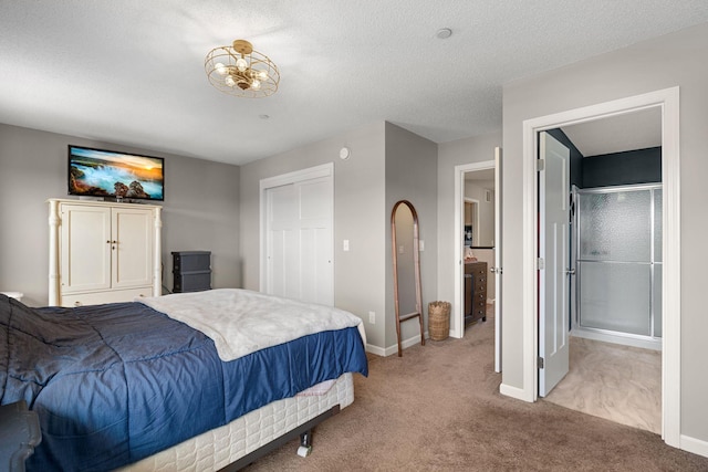 bedroom with light carpet, a closet, a textured ceiling, and baseboards