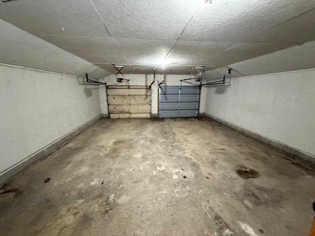 parking deck featuring a garage door opener