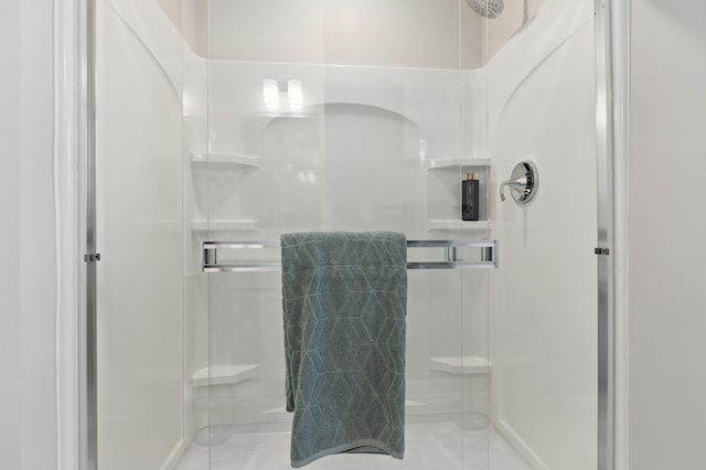 bathroom with a stall shower