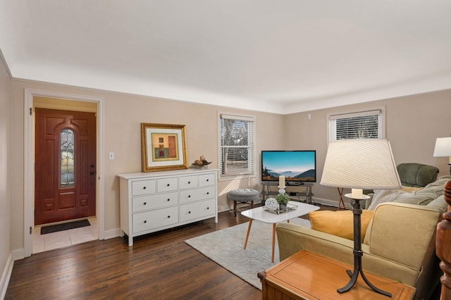 living room with dark wood-style flooring and baseboards