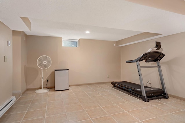 workout room featuring light tile patterned floors, recessed lighting, baseboard heating, a textured ceiling, and baseboards