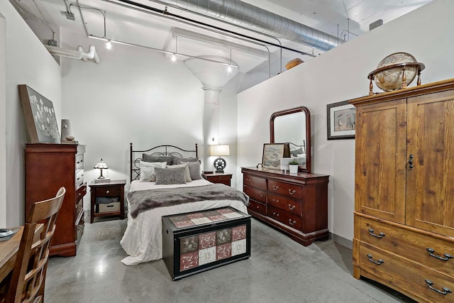 bedroom with concrete flooring