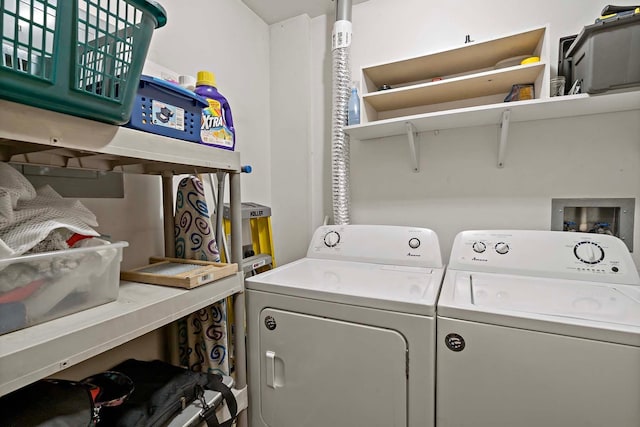 washroom featuring laundry area and independent washer and dryer