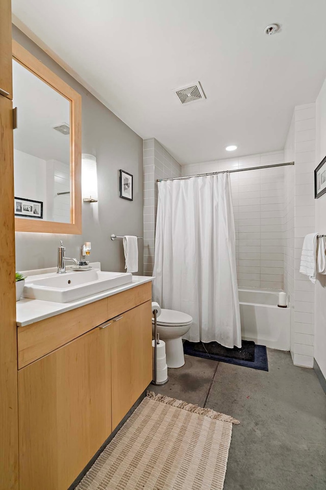 bathroom with visible vents, toilet, shower / bath combo, concrete flooring, and vanity