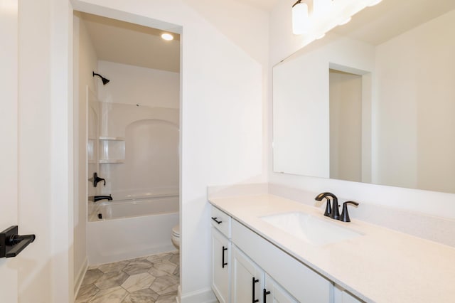 full bath with tile patterned floors, shower / bath combination, toilet, and vanity