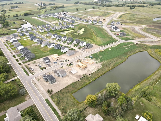 aerial view with a residential view and a water view