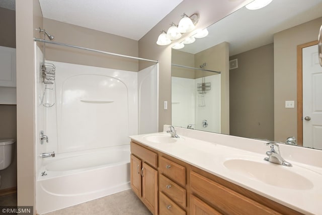 full bath with  shower combination, double vanity, a sink, and tile patterned floors