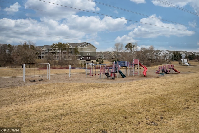 community jungle gym featuring a residential view