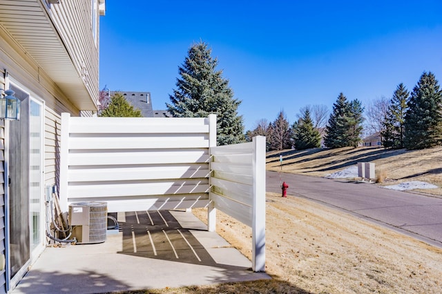 exterior space featuring central AC unit