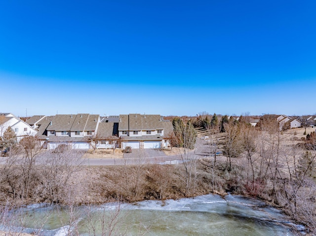 view of yard with a residential view