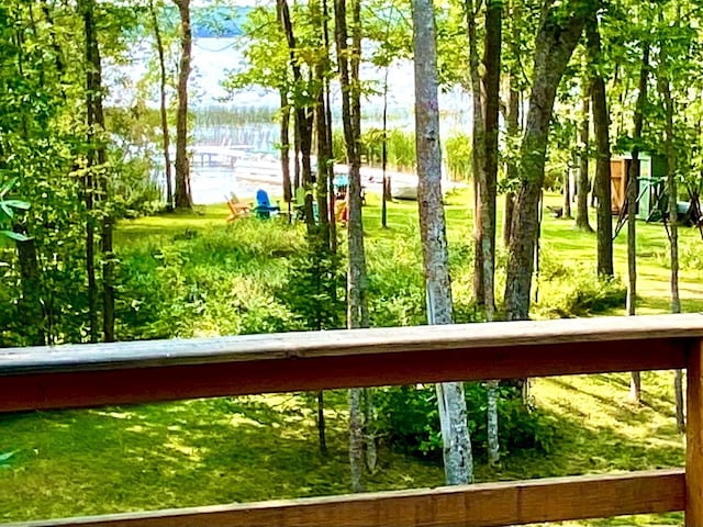 exterior space featuring a water view and a balcony