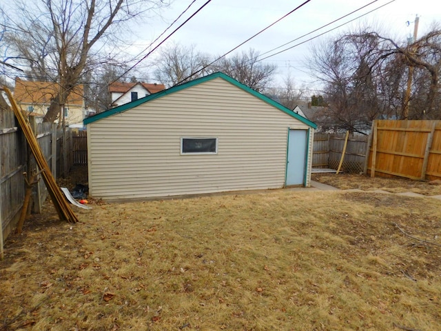 view of outdoor structure featuring a fenced backyard