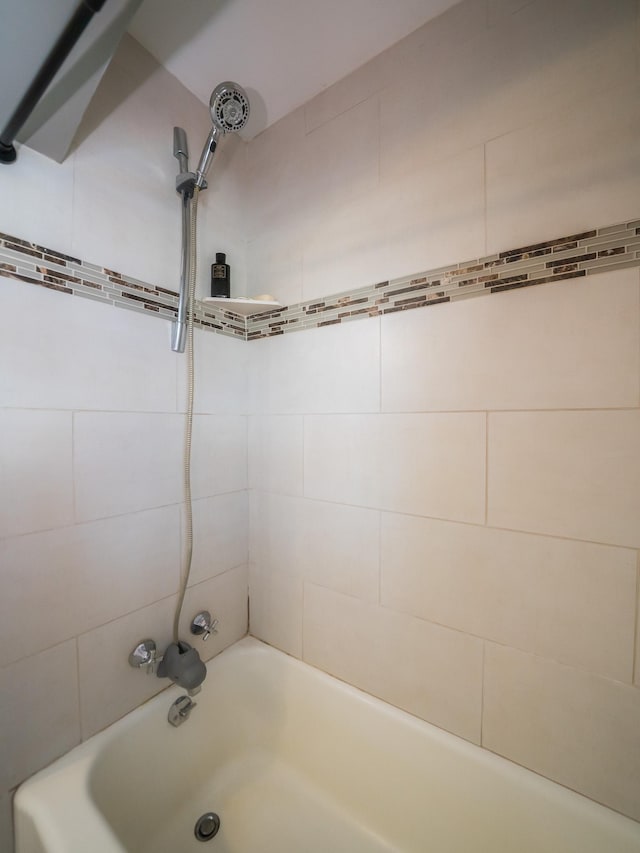 full bath featuring shower / tub combination