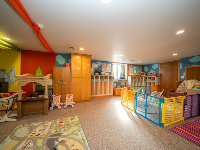 recreation room featuring carpet flooring and recessed lighting