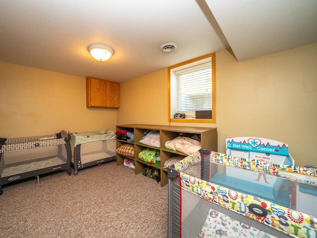 playroom with visible vents and carpet flooring