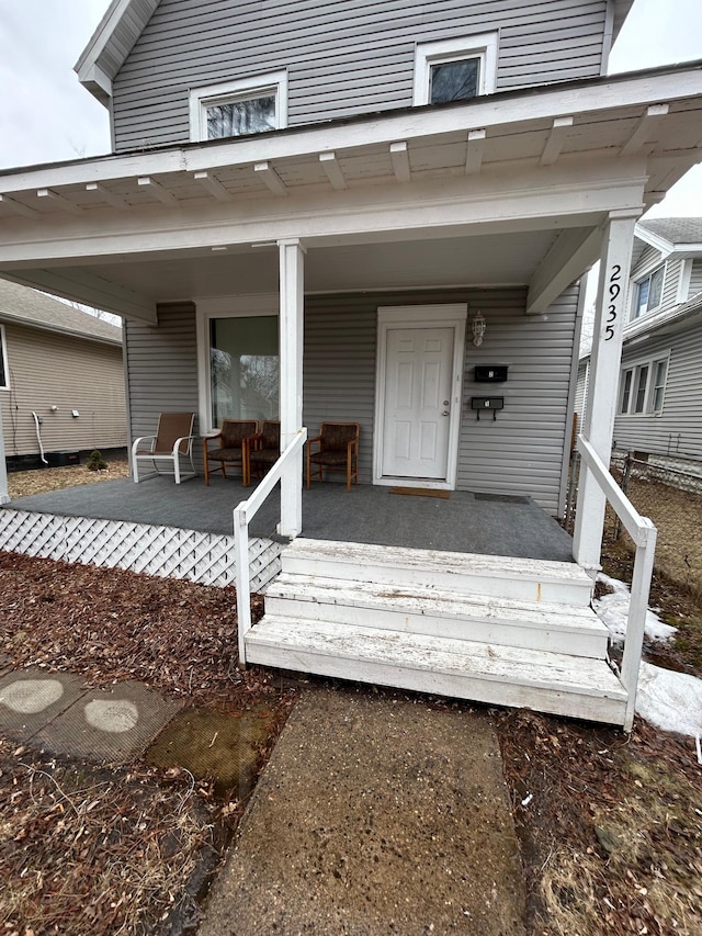 entrance to property with a porch