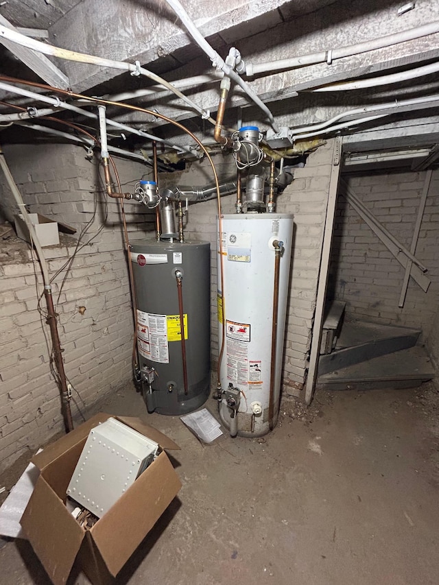 utility room featuring gas water heater