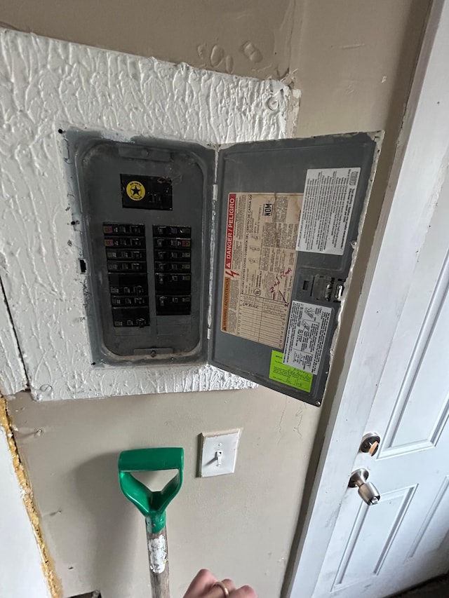 utility room featuring electric panel