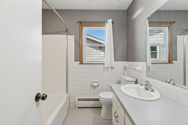 bathroom featuring tile walls, toilet, a baseboard heating unit, a textured ceiling, and  shower combination