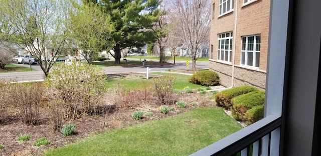 935 Ferndale St N Unit 106, Maplewood, MN 55119 - view of yard with a residential view