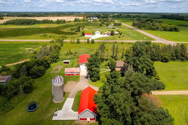 birds eye view of property featuring a rural view