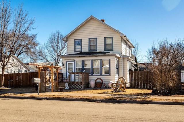 traditional home with fence