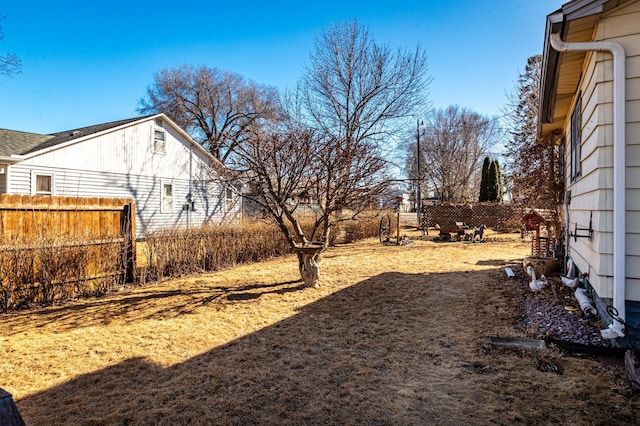 view of yard with fence