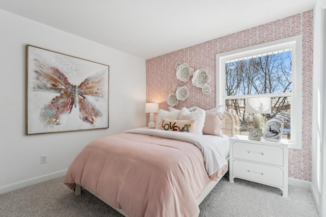 bedroom featuring wallpapered walls, carpet, and baseboards