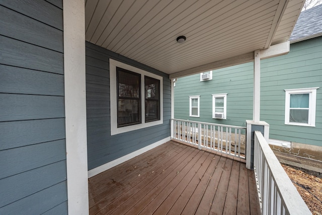 deck with a wall mounted air conditioner