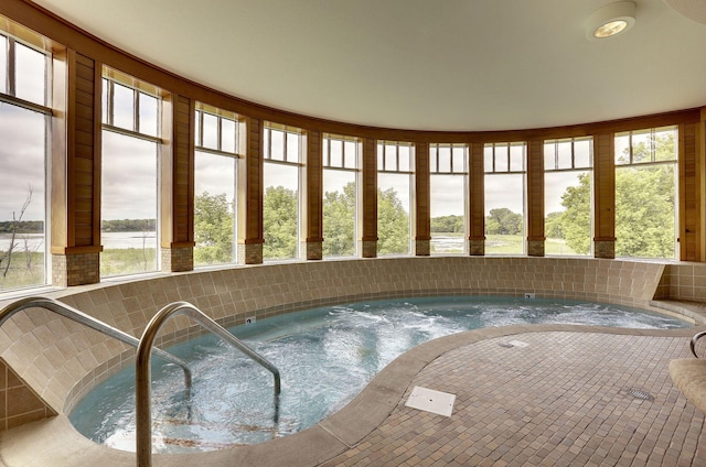 view of pool with an indoor in ground hot tub