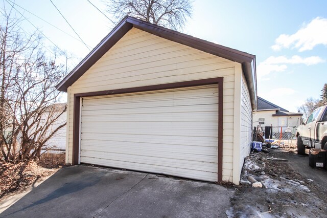 detached garage with fence