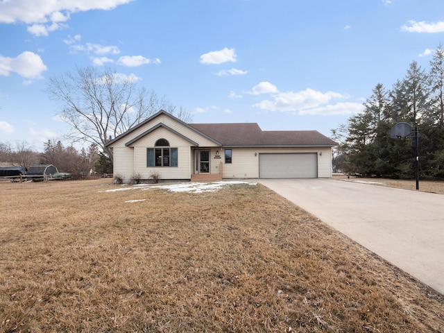 single story home featuring a front yard, concrete driveway, and a garage