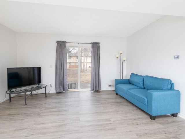 living area with light wood finished floors